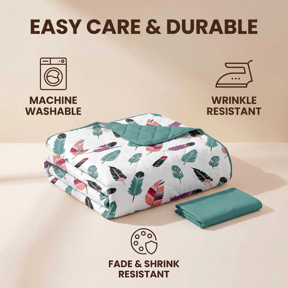 Folded bedspread showing its printed front and solid reverse, with machine-washable, wrinkle-resistant and quick-drying care features