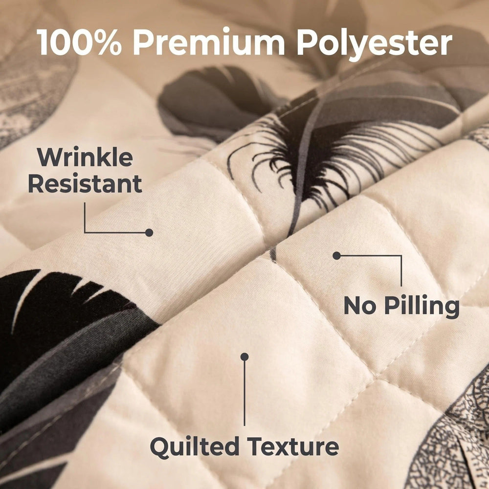 Bedspread close-up showing 130 GSM microfiber fabric, 200 GSM filling and quilted stitching