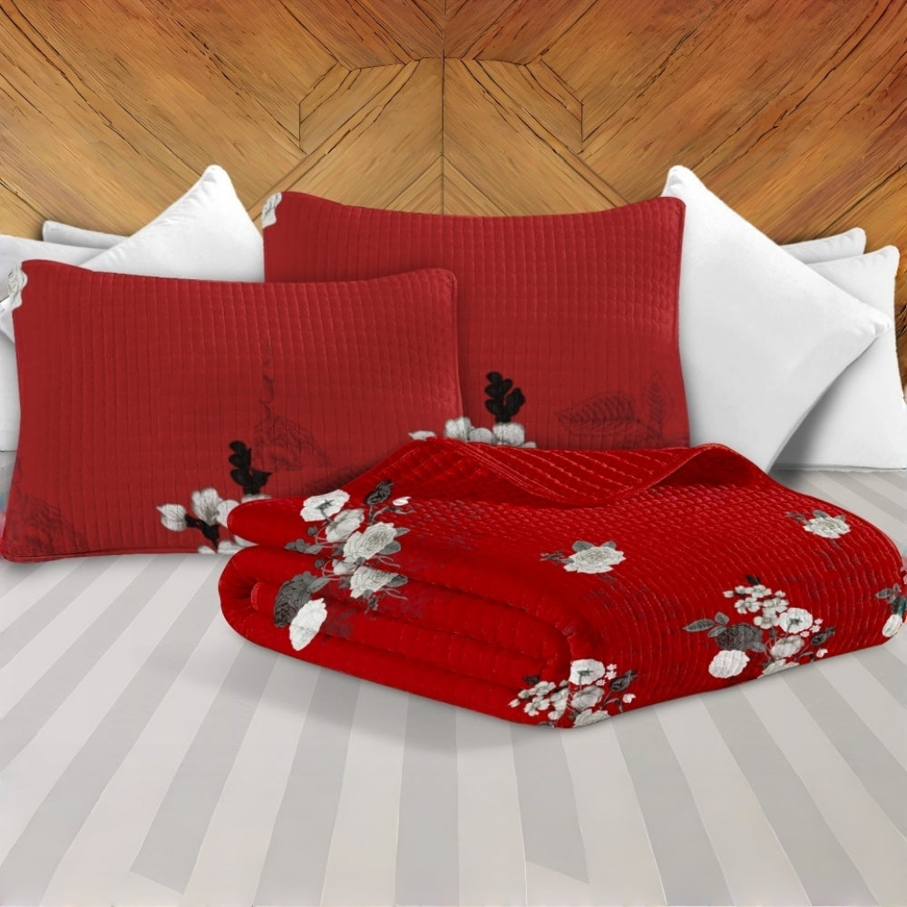 Bedspread close-up showing 130 GSM microfiber fabric, 200 GSM filling and quilted stitching