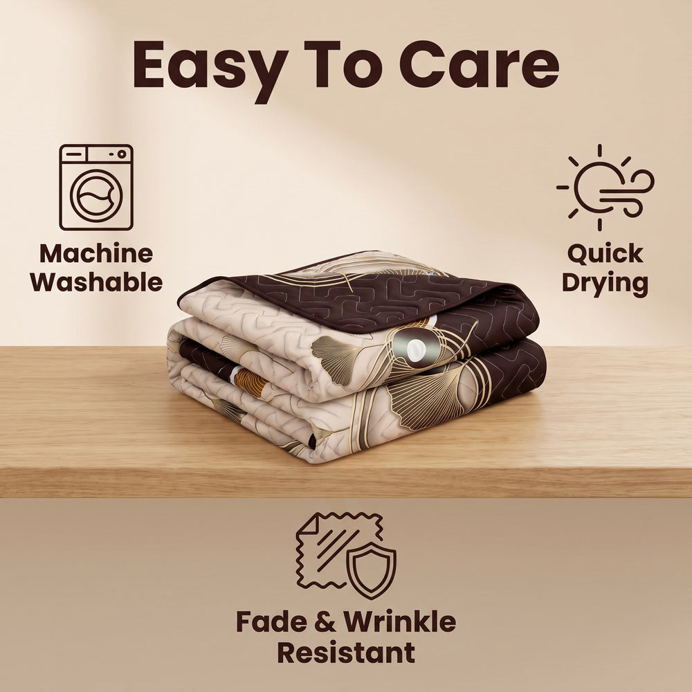 Folded bedspread showing its printed front and solid reverse, with machine-washable, wrinkle-resistant and quick-drying care features