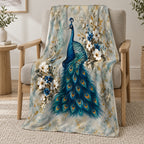 Peacock Garden 50 × 60 inch blanket on a reading chair — styling illustration